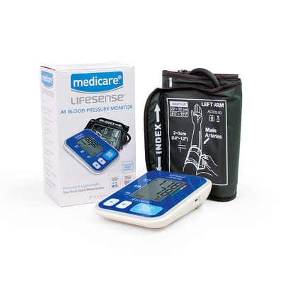 Blood pressure monitor with packaging and cuff on a white background